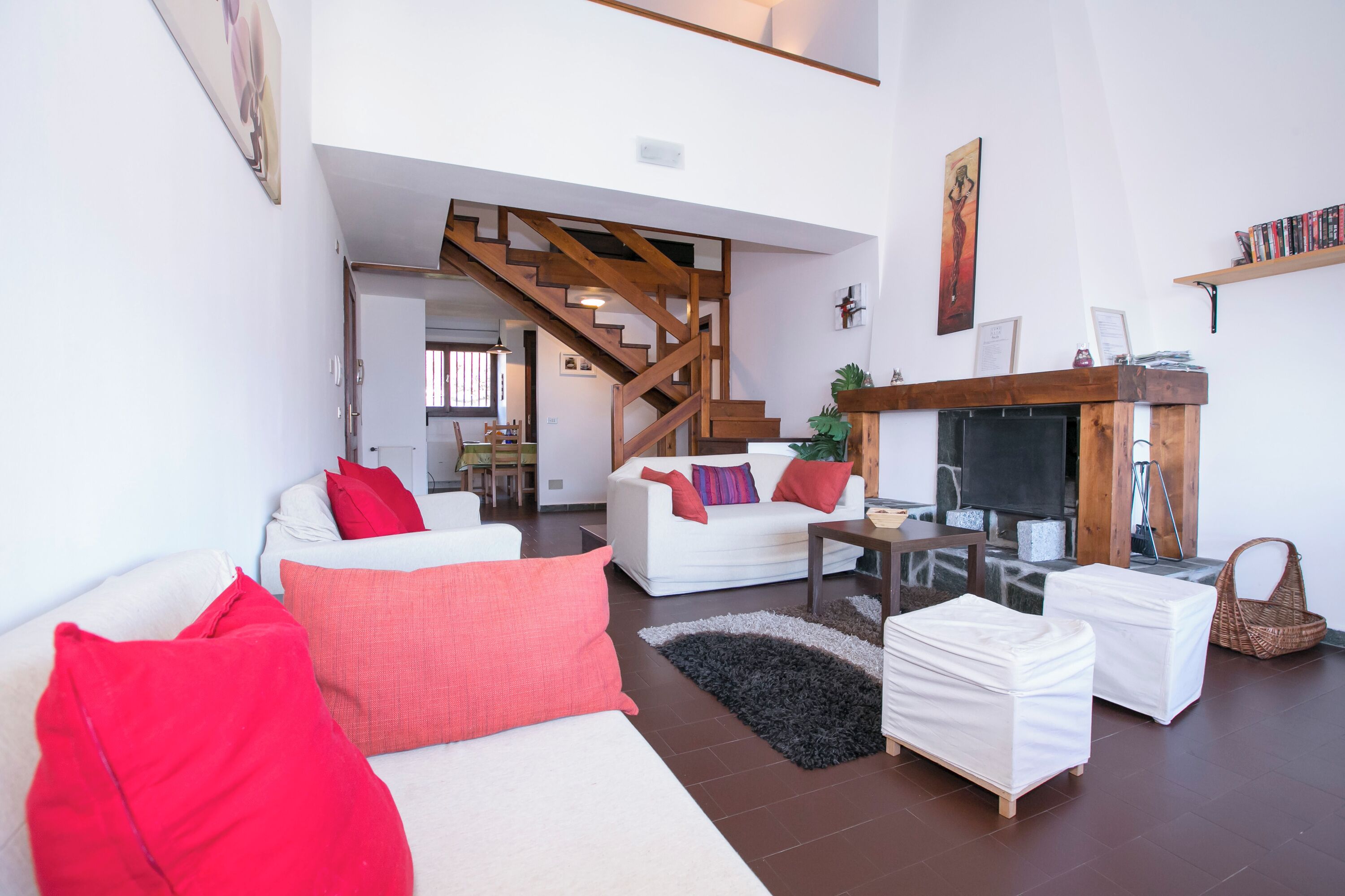 Family Apartment, Multiple Bedrooms, 2 Bathrooms, Mountainside (Cadenabbia Fantastico) | Living area | 21-inch flat-screen TV with cable channels, TV, fireplace