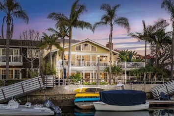 Dusk View of the Home - Overlooking Naples Canals