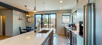 Family-friendly home near town with a private hot tub, balcony, & gas fireplace