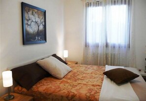 Family Apartment, Multiple Beds, 2 Bathrooms, Mountainside (Vista d'Oro Ulivo Apt. 8/10) | 2 bedrooms, WiFi, bed sheets