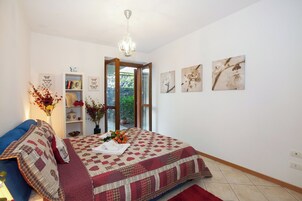 Family Apartment, Multiple Bedrooms, Mountainside (Vista d'Oro Ulivo Apt. 4) | 2 bedrooms, iron/ironing board, WiFi, bed sheets