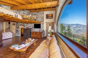Family Villa, Multiple Bedrooms, Mountainside (Villa Victoria) | Living area | 24-inch TV with cable channels, fireplace - Villa Victoria (Argegno)