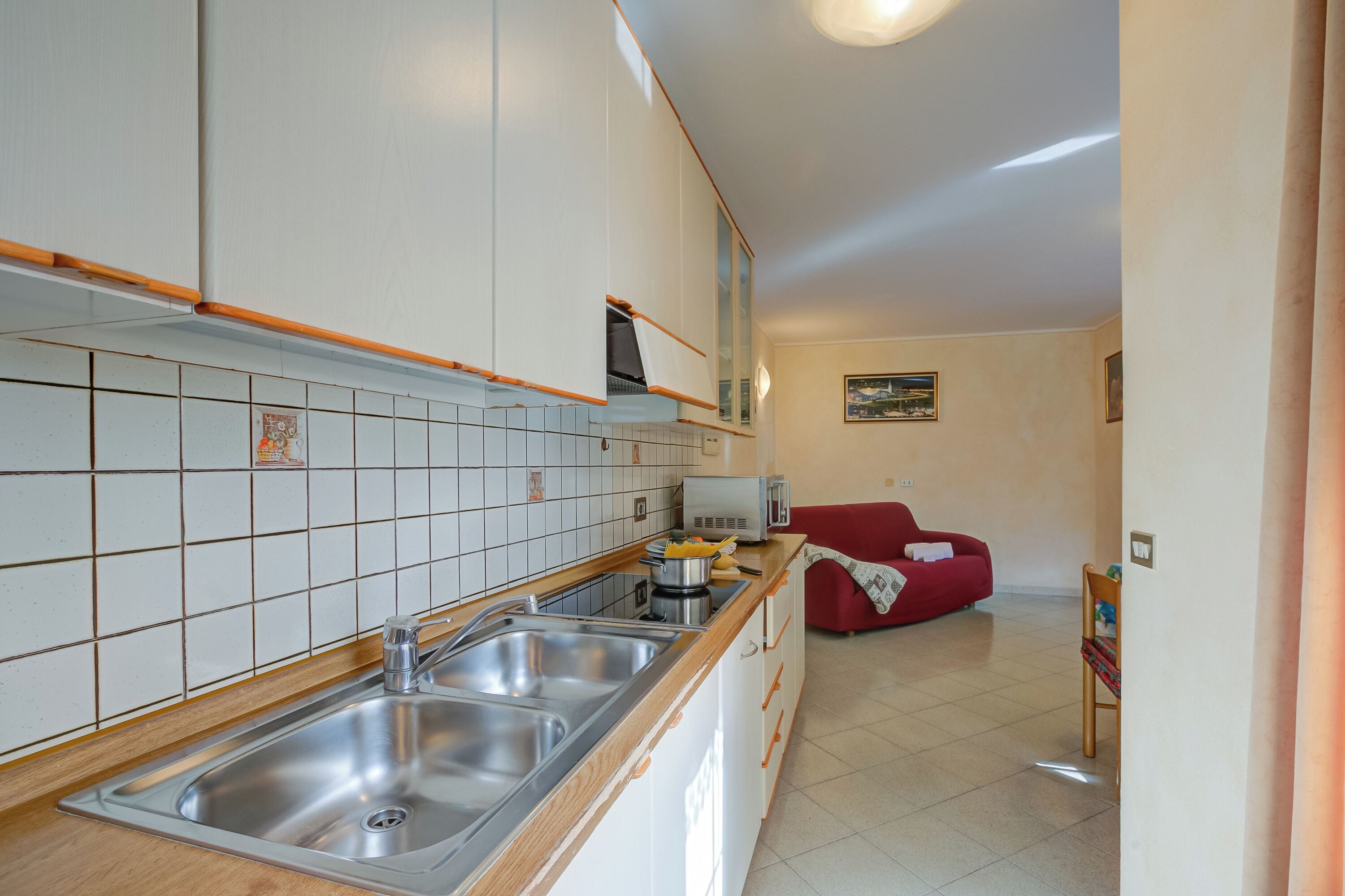 Apartamento família, vários quartos, 2 banheiros (Rododendro) | Cozinha privada | Micro-ondas, cooktop, lava-louças, cafeteira/chaleira