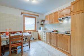 Family Apartment, 3 Bedrooms, 2 Bathrooms (Stella Alpina) | Private kitchen | Fridge, microwave, stovetop, dishwasher