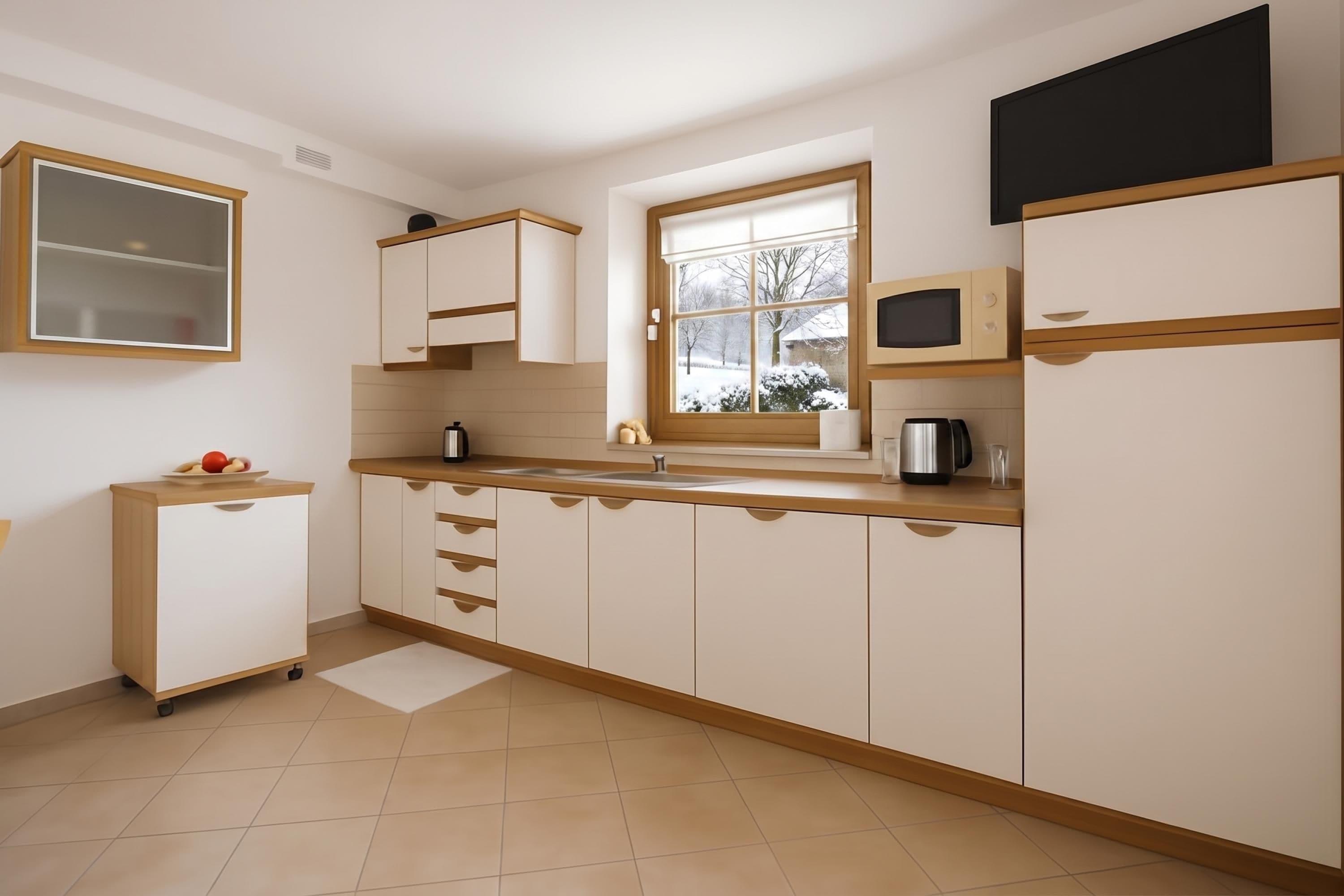A kitchen with white cabinets, a window, a microwave, and a kettle.