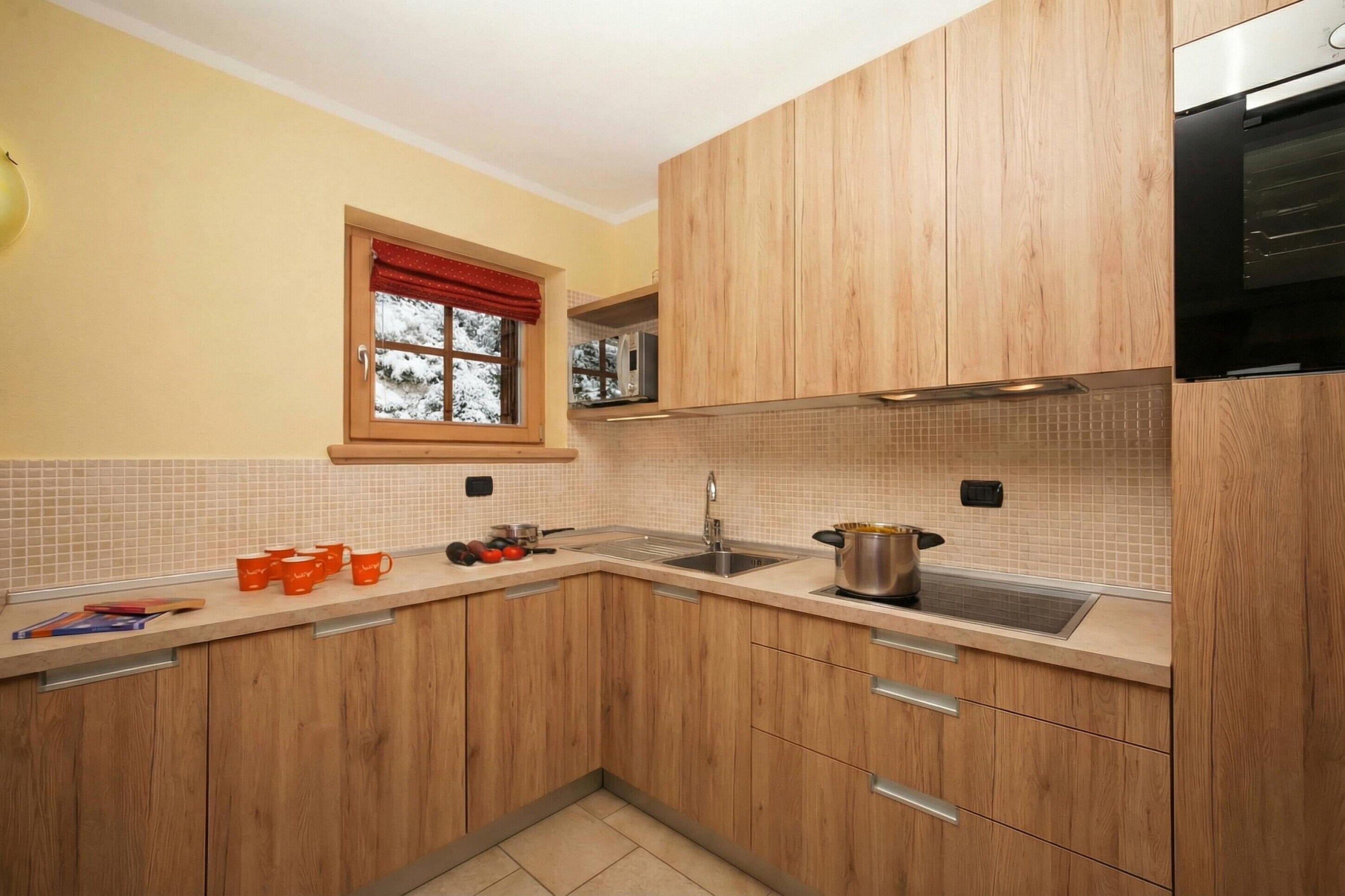 Apartamento família, vários quartos, ao lado da montanha (Sponda Ski in- Ski out 50m) | Cozinha privada | Micro-ondas, fogão, cooktop, lava-louças