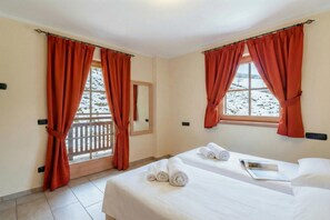 Family Apartment, Multiple Bedrooms, Mountainside (Sponda Ski in- Ski out 50m) | 2 bedrooms, WiFi, bed sheets