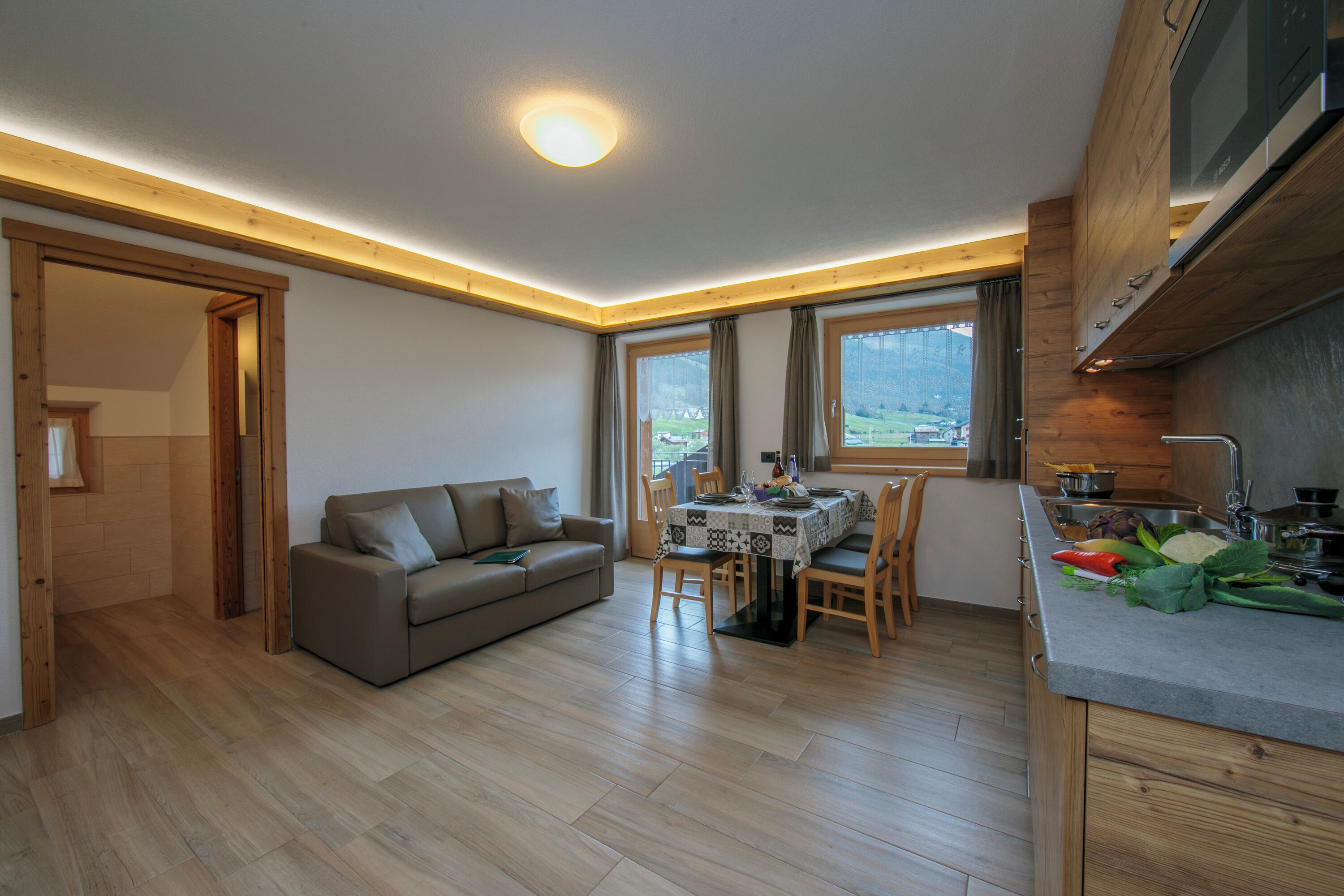 Family Apartment, Multiple Bedrooms (Volga) | Living area | 24-inch flat-screen TV with satellite channels, TV