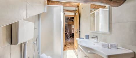 Family Apartment, 1 Bedroom, Fireplace, Mountainside (Arianna) | Bathroom | Bathtub, bidet, towels, soap
