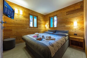 Familienapartment, Mehrere Schlafzimmer (Marlies Ski in - Ski out 50m) | 1 Schlafzimmer, kostenloses WLAN, Bettwäsche