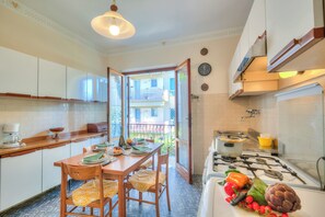 Family House, Multiple Bedrooms, Mountainside (Casa Vittoria 800m from sea) | Private kitchen | Full-sized fridge, microwave, oven, stovetop - Casa Vittoria 800m from sea (Forte dei Marmi)