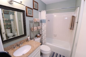 Combined shower/bathtub, towels, soap, shampoo - Live the Beach Life Right Across the Street From the Beach w Large Pool (South Padre Island)