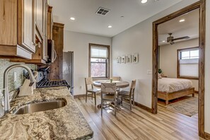1 bedroom, desk, iron/ironing board, travel cot