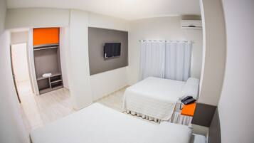 Quarto luxo | Frigobar, Wi-Fi de cortesia, roupa de cama