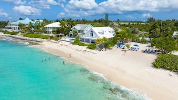 On the beach, sun loungers, beach towels