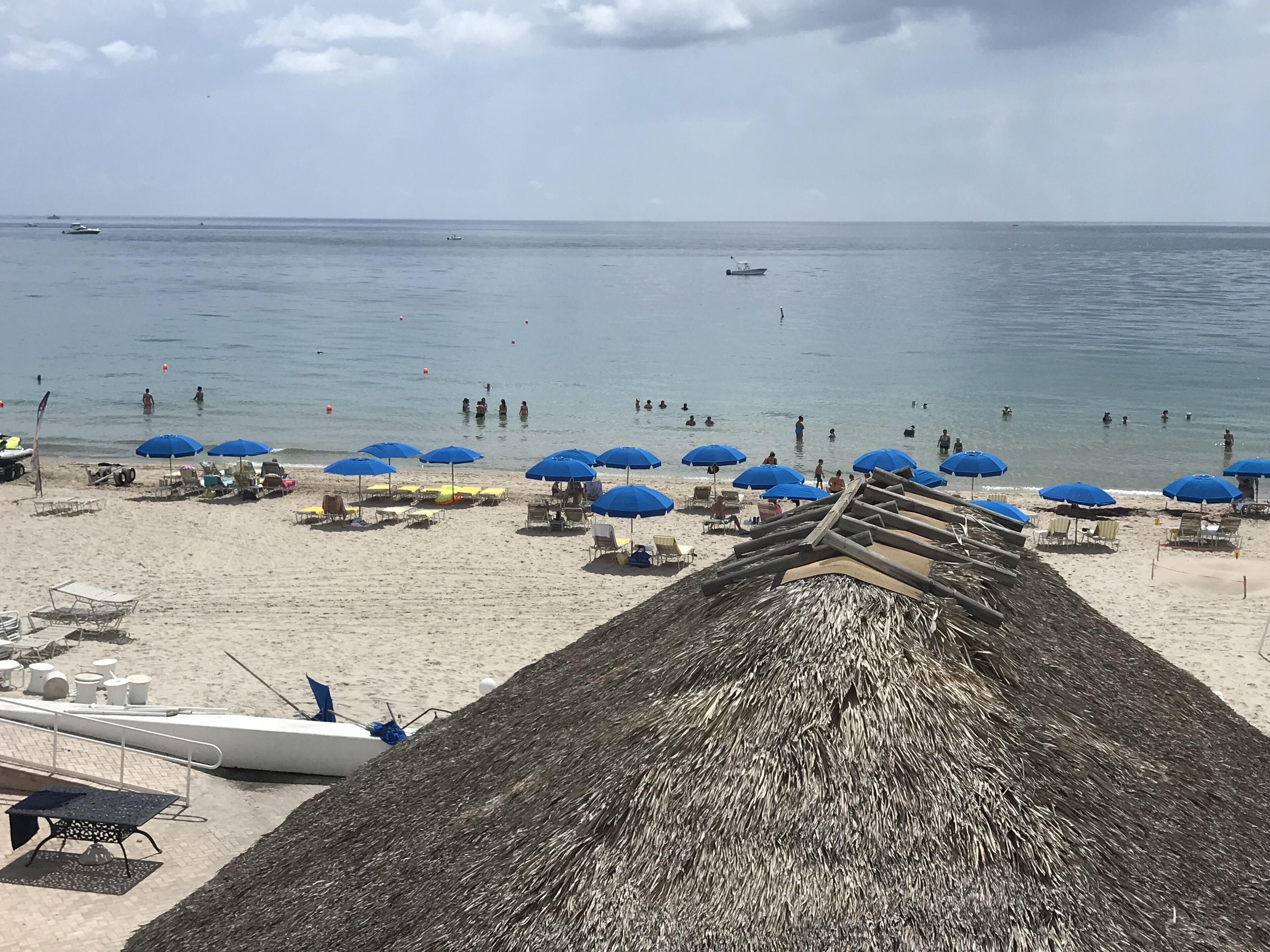 On the beach, sun loungers, beach towels