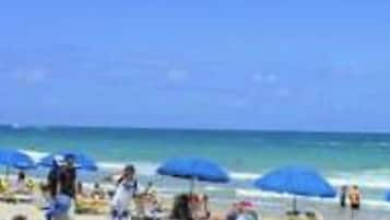 On the beach, sun-loungers, beach towels