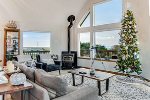 TV, table tennis - Spacious coastal home with private hot tub, ocean view, wood stove & EV charging (Pacific Beach)