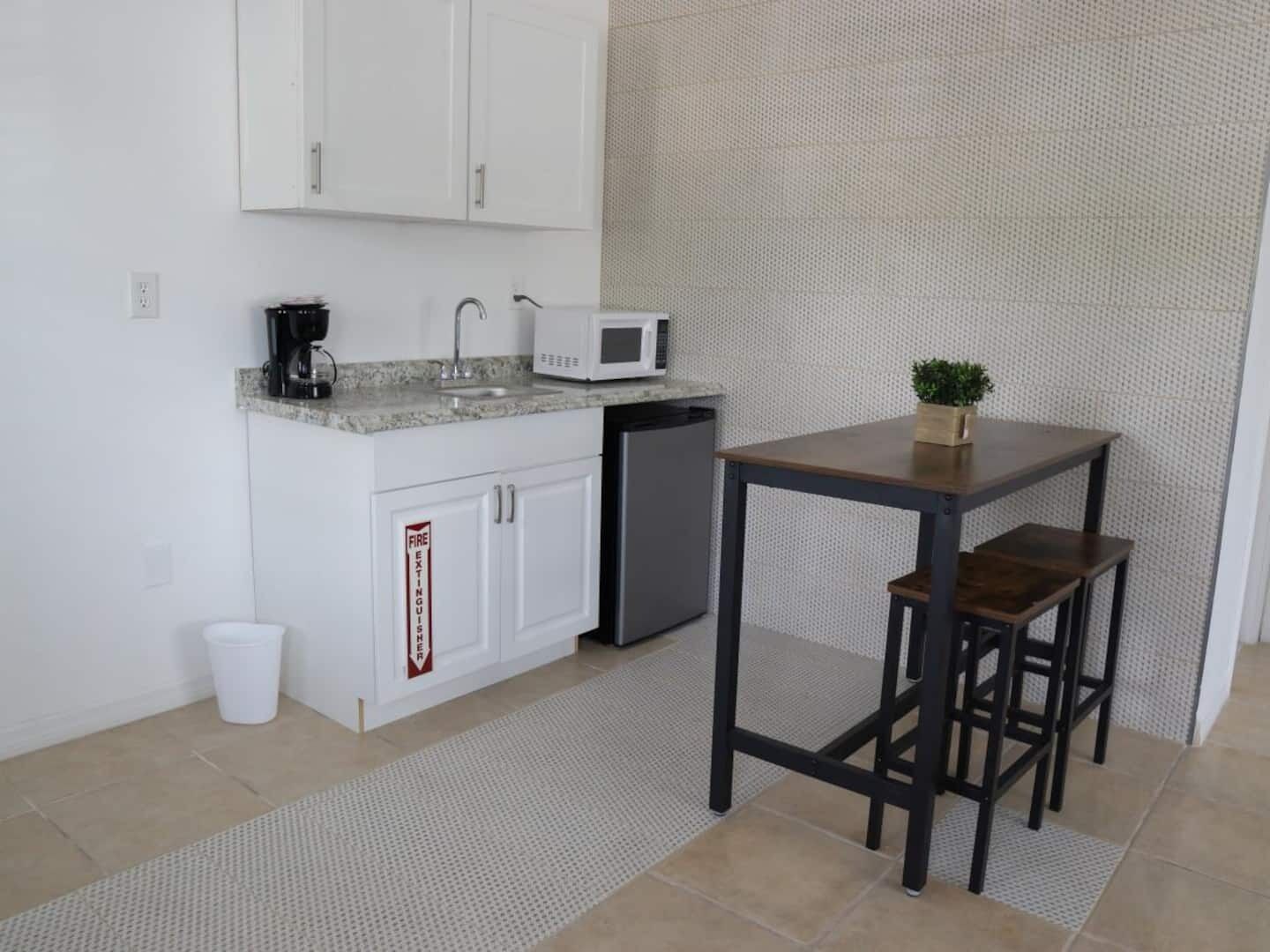 Fridge, microwave, coffee/tea maker, toaster