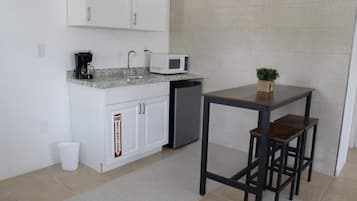 Fridge, microwave, coffee/tea maker, toaster