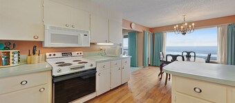 Lovely oceanfront condo with sweeping water views, & balcony