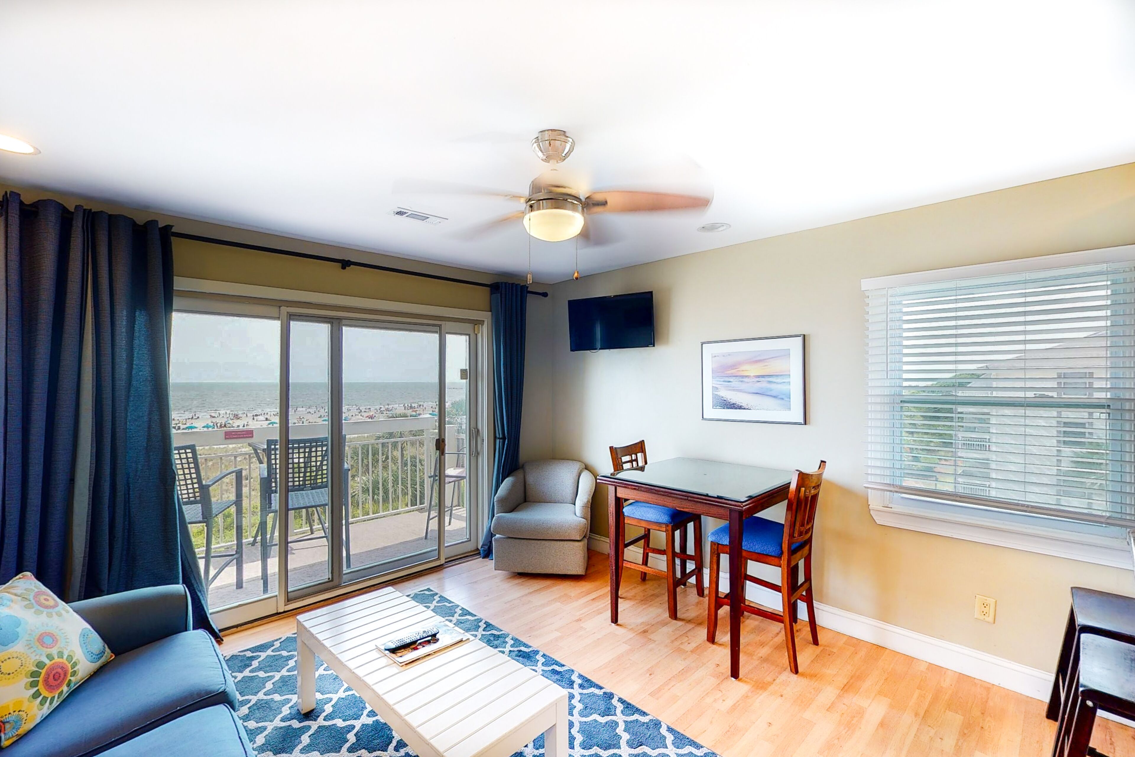Charming coastal retreat with beach access, private balcony, & pool - near golf