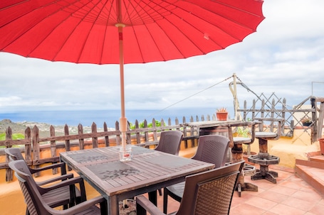 Outdoor dining. Holiday Home "Carmela" with Amazing Ocean Views, Terrace & Wi-Fi