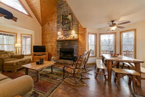 Smart TV, fireplace, books, offices