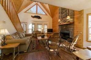 Smart TV, fireplace, books, offices