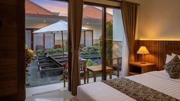 Superior Room, Pool Access | Minibar, desk, laptop workspace, bed sheets