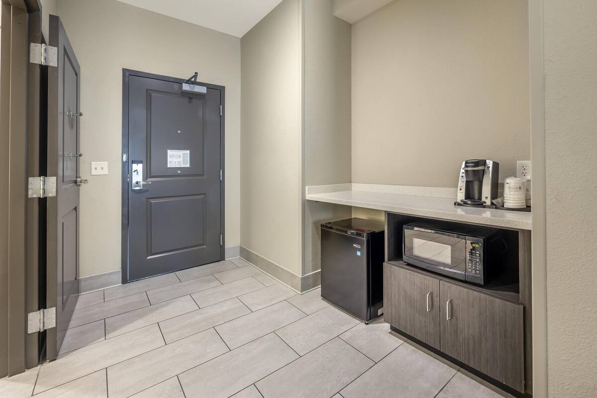 suite, 1 king bed, accessible, refrigerator & microwave (with sofabed) | 1 bedroom, pillow-top beds, desk, laptop workspace