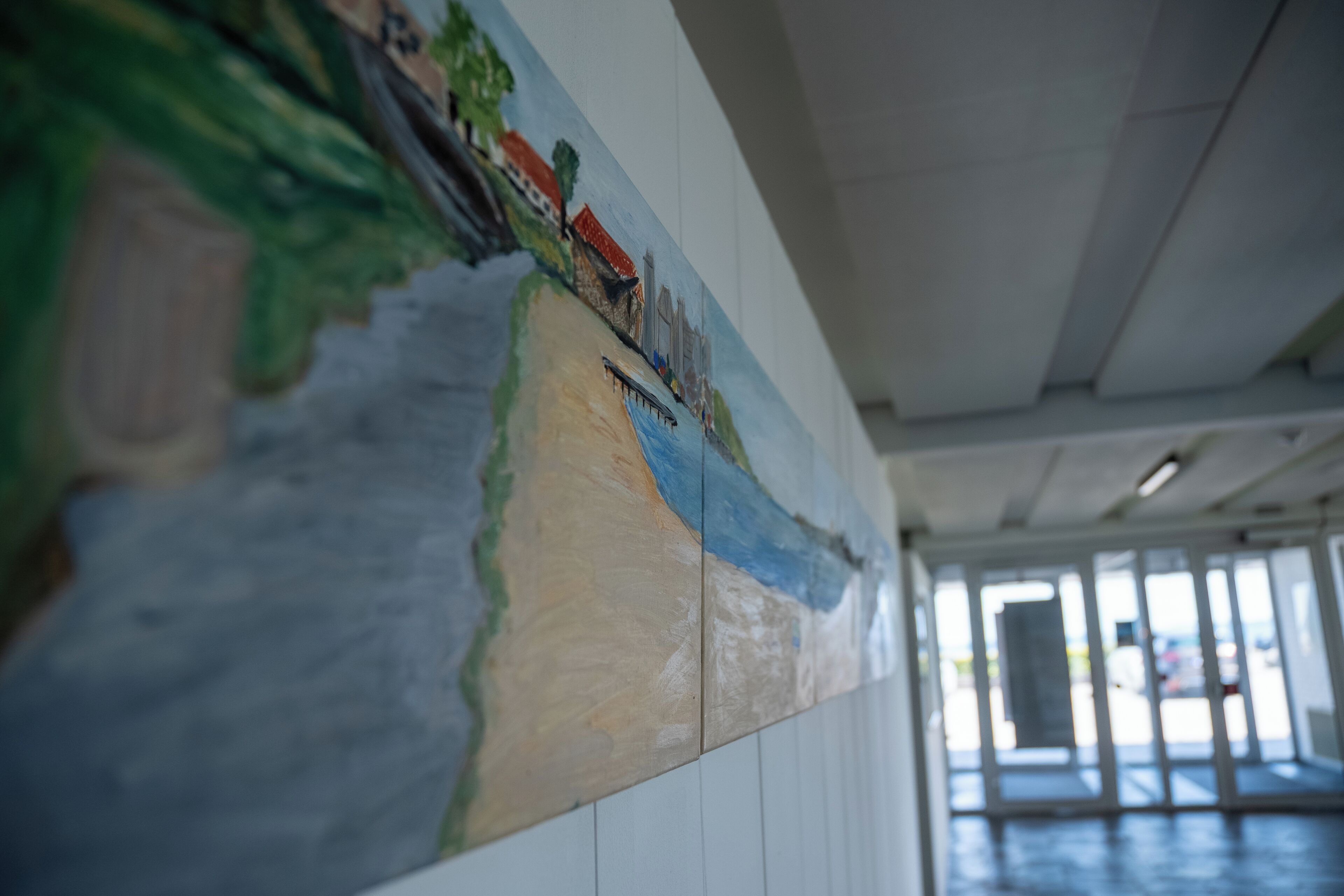 A mural with a landscape scene.