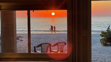 On the beach, sun loungers, beach towels