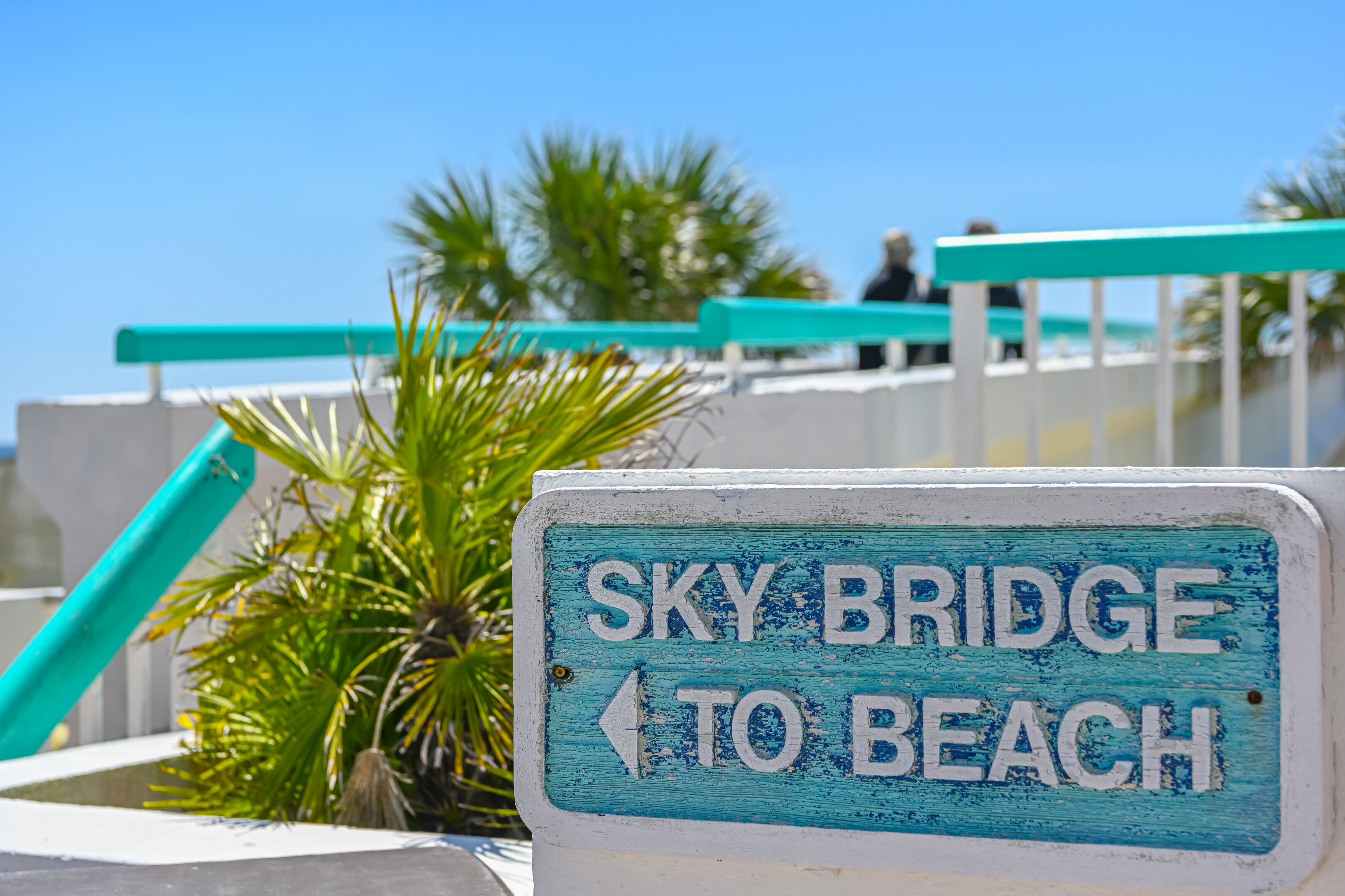 A sign indicating 'Sky Bridge to Beach'.