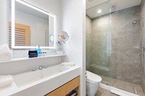 Shower, hair dryer, towels, soap