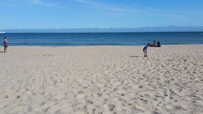 På stranden och strandhanddukar