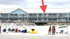 A beachfront hotel with multiple balconies and a sandy beach area. - WOW Closest to the Gulf Luxury 4 Bed,3Bath 3 Decks Sleeps 14 2500 SF (Pensacola Beach)