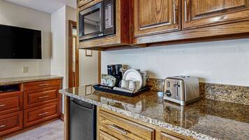 Microwave, coffee/tea maker, cookware/dishes/utensils