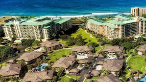 A resort with multiple buildings, a swimming pool, and a view of the ocean. - KLVR welcomes you to Honua Kai Luana 11C Oceanfront Resort Resort and POOL view  (Lahaina)
