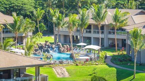 A resort with a swimming pool, palm trees, and a waterfall feature. - KLVR welcomes you to Honua Kai Luana 11C Oceanfront Resort Resort and POOL view  (Lahaina)