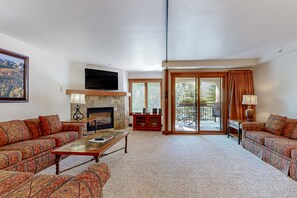 TV, fireplace, books