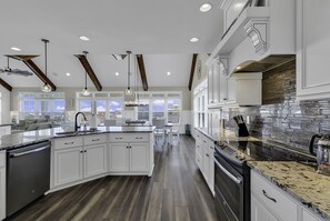 Fridge, microwave, oven, stovetop - 5-bedroom Vacation Home Just a Short Walk to the Ocean Isle Beach (Ocean Isle Beach)