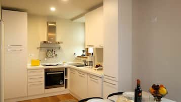 Een oven, een vaatwasser, een broodrooster, een vriezer