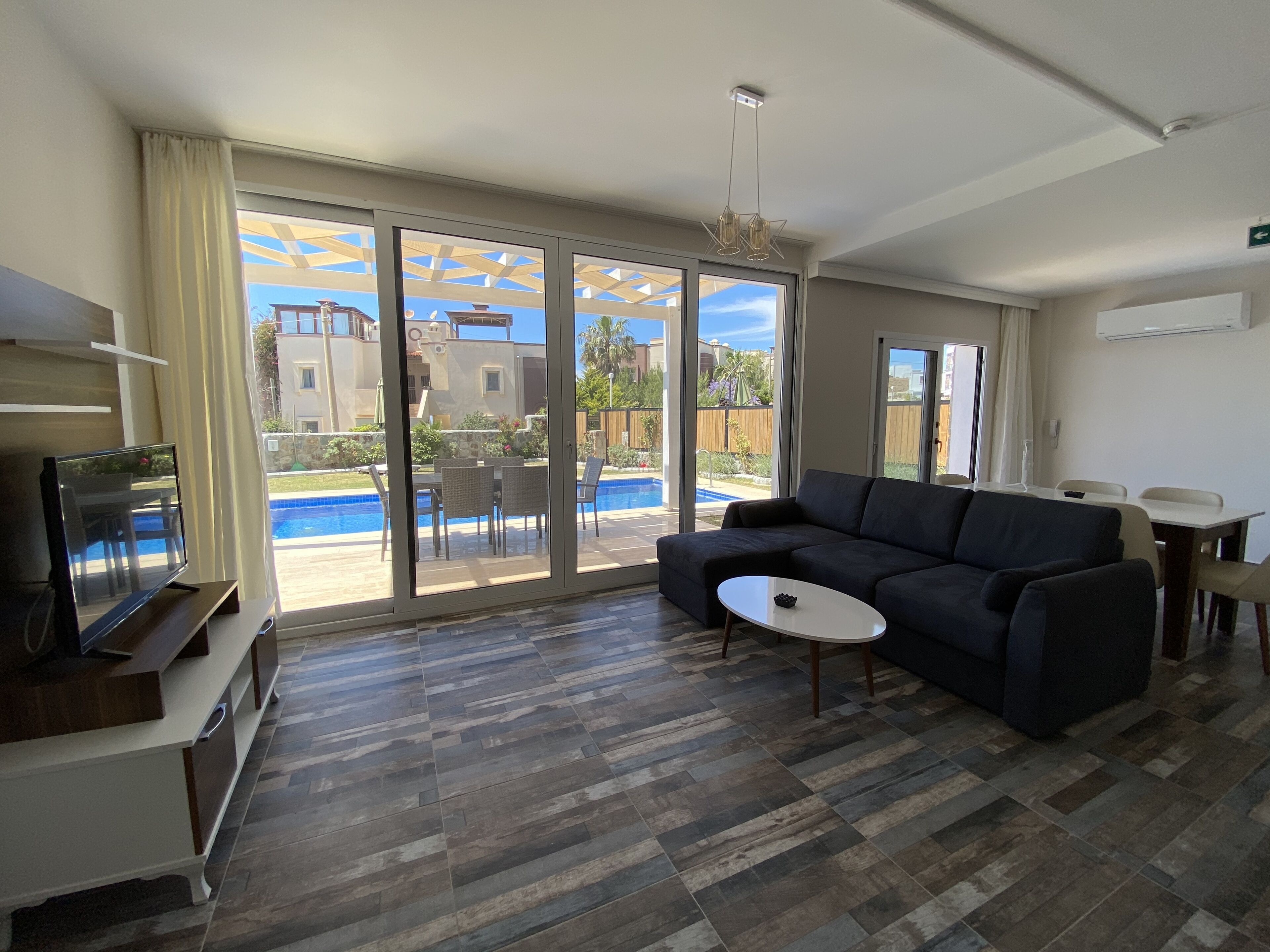 Duplex, 3 Bedrooms | Living area | LCD TV