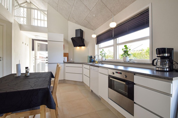 Fridge, stovetop, dishwasher, coffee/tea maker