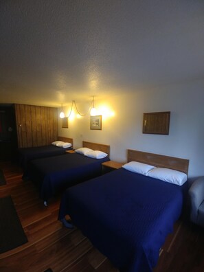 Standard Triple Room | Premium bedding, blackout drapes, iron/ironing board, free WiFi - Falls Motel (International Falls)