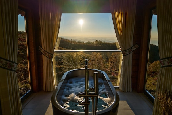 Romantic Bungalow | Premium bedding, Select Comfort beds, minibar, desk