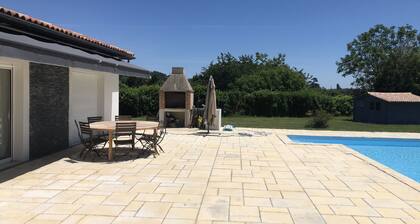 Modern 4 bed villa, air-con in living area, fabulous terrace/garden, large pool.