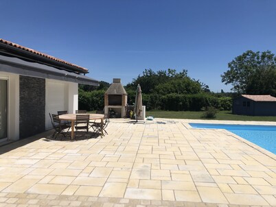 Modern 4 bed villa, air-con in living area, fabulous terrace/garden, large pool.