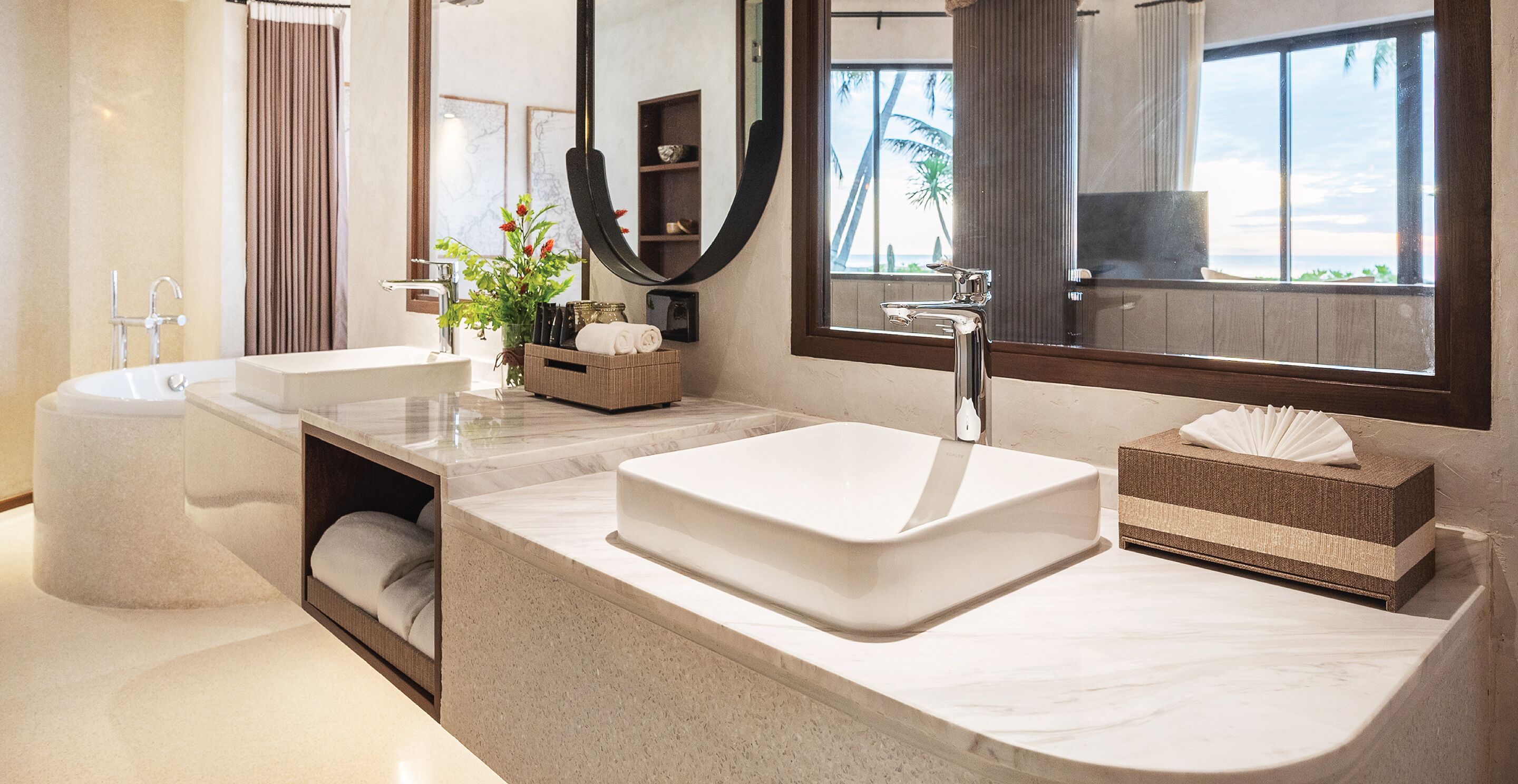 pool villa beach front | bathroom | designer toiletries, hair dryer, bathrobes, slippers